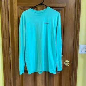 Large teal blue patagonia crew neck ling sleeve tee